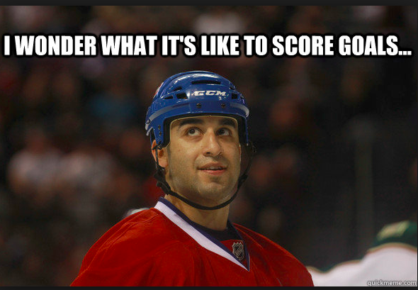 Scott Gomez qui te dit de ne pas se traîner les pieds..