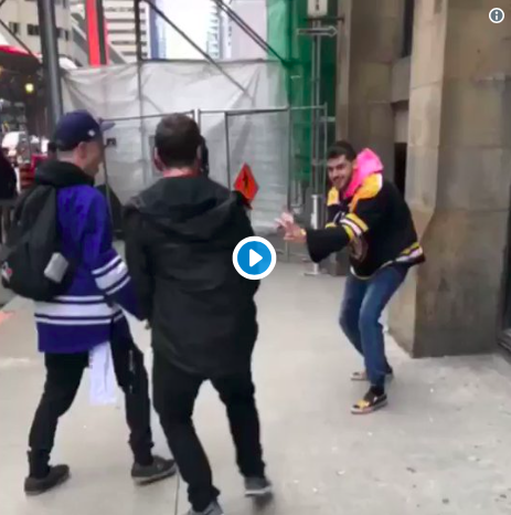 Un fan des Leafs met un fan des Bruins en FEU!!!!