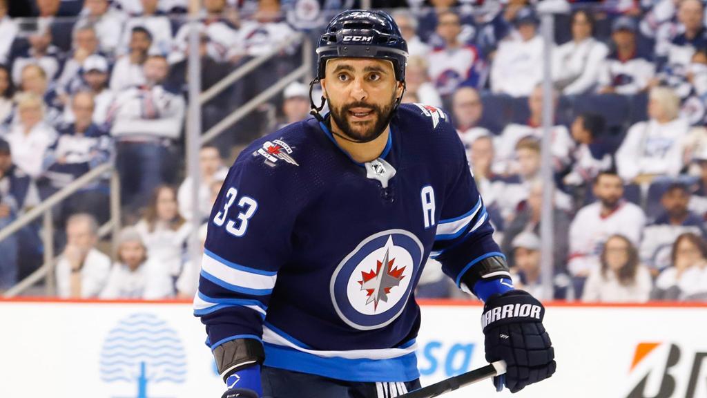 Le Wild a TOUT FAIT...pour convaincre Dustin Byfuglien....