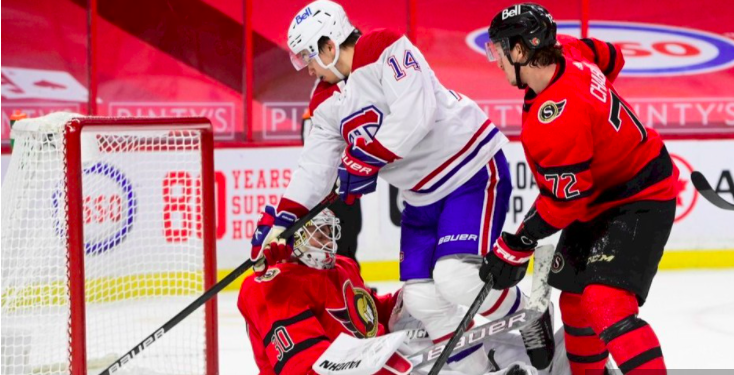 Phil Danault s'est COUCHÉ...Devant Nick Suzuki..