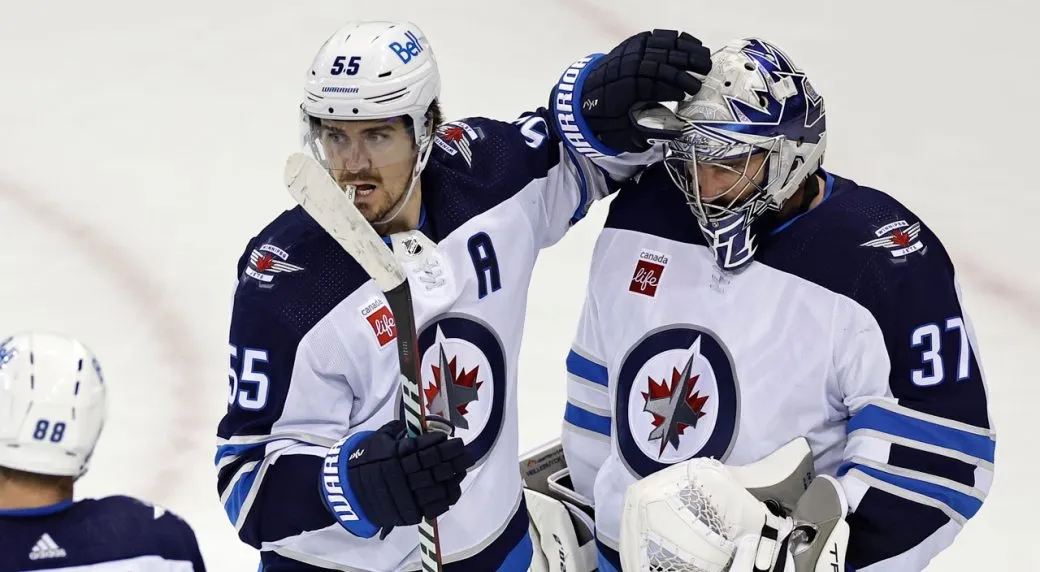 Énorme nouvelle dans la LNH: Connor Hellebuyck et Mark Scheifele crée une commotion